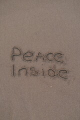 Peace Inside – Handwritten Message on Volcanic Sand