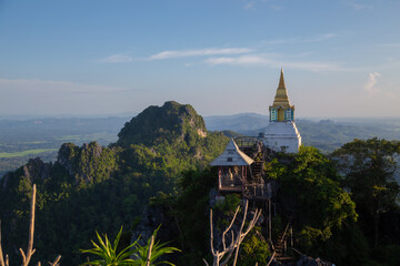 Wat Chaloem Phrakiat Phra Chom Klao Rachanusorn. This temple has small white pagodas lined up on...