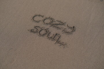 Cozy Soul – Handwritten Message on Volcanic Sand