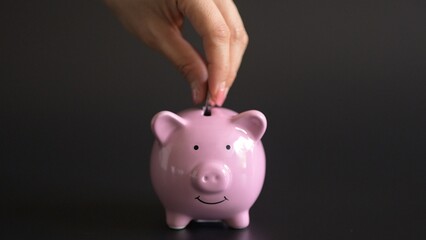 Saving money action home financial planning content indoor environment close-up viewpoint personal finance concept for budgeting and savings strategies