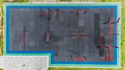 Outdoor gym for street workout aerial drone view, modern sports ground with bars and equipment for outdoor fitness and exercise, working out in calisthenics park outdoors, healthy lifestyle in city 