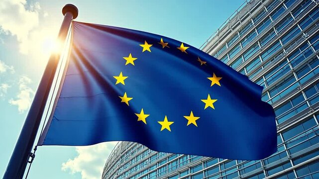 The waving flag of Europe in sunlight. A symbol of unity, peace, and cooperation
