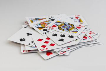 Pile of playing cards. Colorful card deck mix on white isolated background