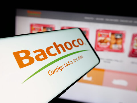 Stuttgart, Germany - 05-15-2025: Smartphone with logo of company Industrias Bachoco S.A. de C.V. on screen in front of website. Focus on center-left of phone display.