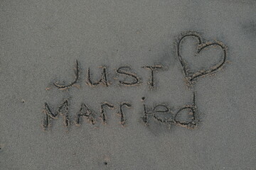 Just Married Text and Heart on Volcanic Black Sand Beach
