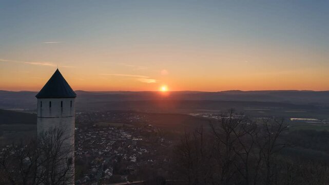 Sunset over a medieval tower and town, Burg Plesse, Bovenden