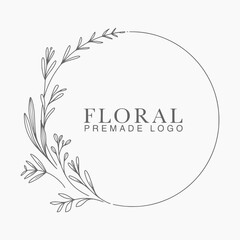 Vector floral hand drawn logo template in elegant and minimal style with black color on grey background illustration. Circle frames logos. For badges, labels, logotypes and branding business identity.