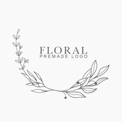 Obraz premium Vector floral hand drawn logo template in elegant and minimal style with black color on grey background illustration. Circle frames logos. For badges, labels, logotypes and branding business identity.