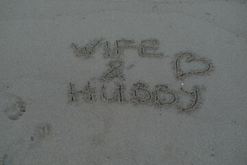 Wife & Hubby Message on Volcanic Sand with Heart Symbol