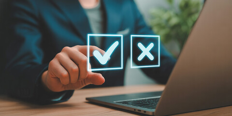 Businessperson Making a Choice Selecting Checkmark or Cross on Laptop Screen