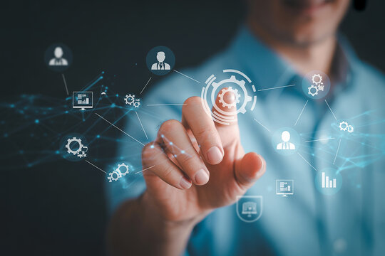 Man Interacting with a Futuristic Digital Interface Showing Networked Gears and Data