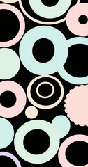 Pastel circles and rings on a black background create a fun pattern