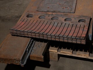 A pile of metal pieces with a rusty appearance
