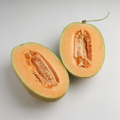 Sliced melon on white background