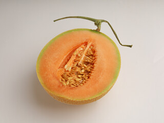 Sliced melon on white background