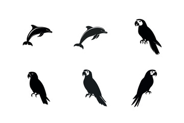 Dolphin and macaw parrot silhouettes set