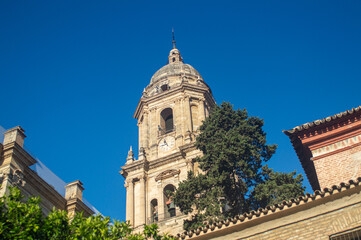 Admiring the magnificent architecture and historic grandeur of the iconic Malaga Cathedral in Malaga, Spain
