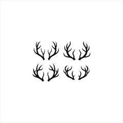 Simple silhouette illustration of several sets of elegant deer antler designs in black and white