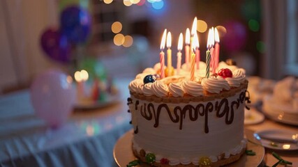 Bright Dessert for Child's Birthday Party on Background of Bokeh Light Bulbs Garlands. Birthday Cake with Burning Candles, chocolate glaze is Rotating on Stand on Table in House. Family. Childhood - Powered by Adobe
