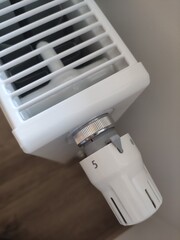 White radiator providing warmth and comfort in modern apartment