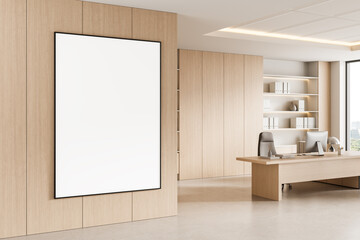 Modern minimalist office interior with wooden furniture, large blank poster on wall, neutral tones and clean design aesthetic. 3D Rendering. 3D Rendering