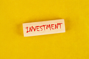 The concept word INVESTMENT. Business and spending or investing concept