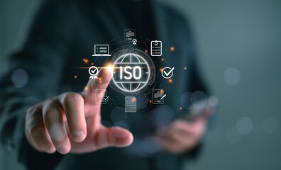 ISO certification and quality management concept with businessman touching global interface and document icons. Ideal for standard compliance, auditing, enterprise quality, and policy assurance.