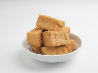 Tofu on a plate, on white background