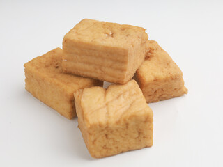 Tofu on a plate, on white background