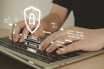 Login. cyber security engineer working on laptop computer with virtual graphic cybersecurity diagram, cloud computing, anti virus, firewall, data protection, internet network technology concept