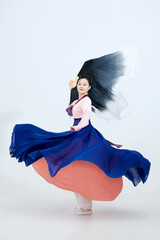 Beautiful dancers performing traditional Korean dance in Yanbian, China