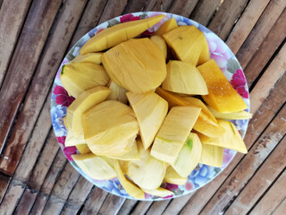 fresh mango on wooden table