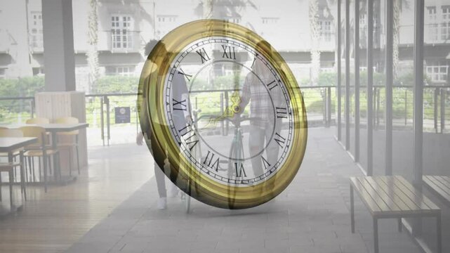 Clock graphic rotating transparent overlay revealing two men walking with bicycle for education
