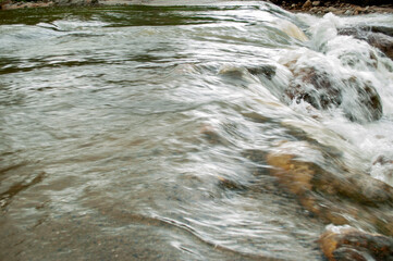 Flowing River from Waterfall in Nakhon Si Thammarat, Thailand – Peaceful Stream in Tropical Forest Landscape
