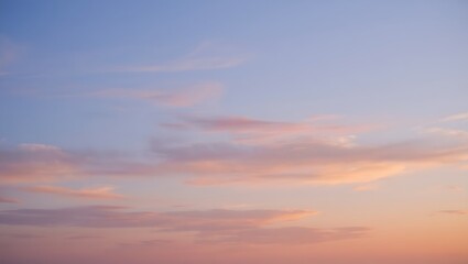 Obraz premium Serene Sunset Sky Pastel Hues and Soft Cloudscape