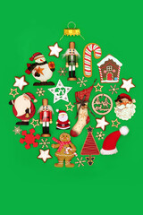 Christmas retro round shape decoration with old fashioned natural Xmas decorations on green with...