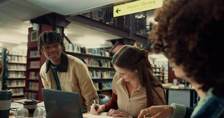 Students, friends and handshake in university library for greeting, study group and welcome. Education, gen z men and happy at college for project support, scholarship success or learning achievement - Powered by Adobe