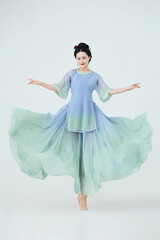 Beautiful dancers performing classical dance in Chinese classical costumes