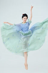 Beautiful dancers performing classical dance in Chinese classical costumes