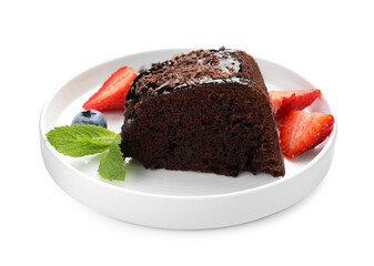 Piece of delicious chocolate bundt cake with strawberries, mint and blueberry isolated on white