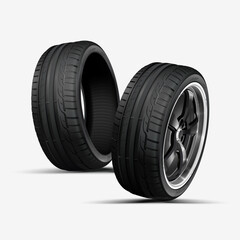 Two car tires on a white background