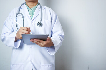 Medicine doctor hands touching on digital tablet. Medical technology and futuristic concept.