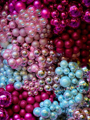 Christmas Texture or background of bright pink balls. Greeting or postcard