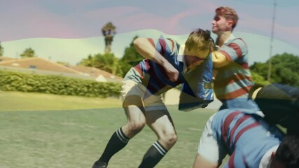 Lead rugby player securing ball on grass field, teammate tackling and recovering for sports drill - Powered by Adobe