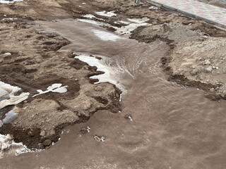 Melting snow on the ground