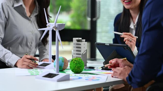Business team working virtual modern smartphone to reduce CO2 emissions carbon footprint climate change to limit global warming.Sustainable development