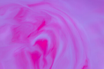 artistic backdrop: close up of stains of purple and violet liquid paints