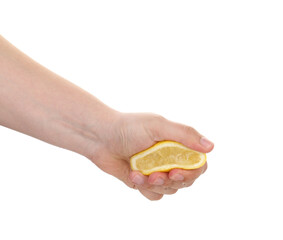 Woman squeezing lemon on white background, closeup