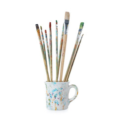 Brushes with color paints in cup isolated on white