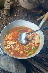 The process of cooking seblak uses traditional methods, namely with a stove and firewood in the rice fields